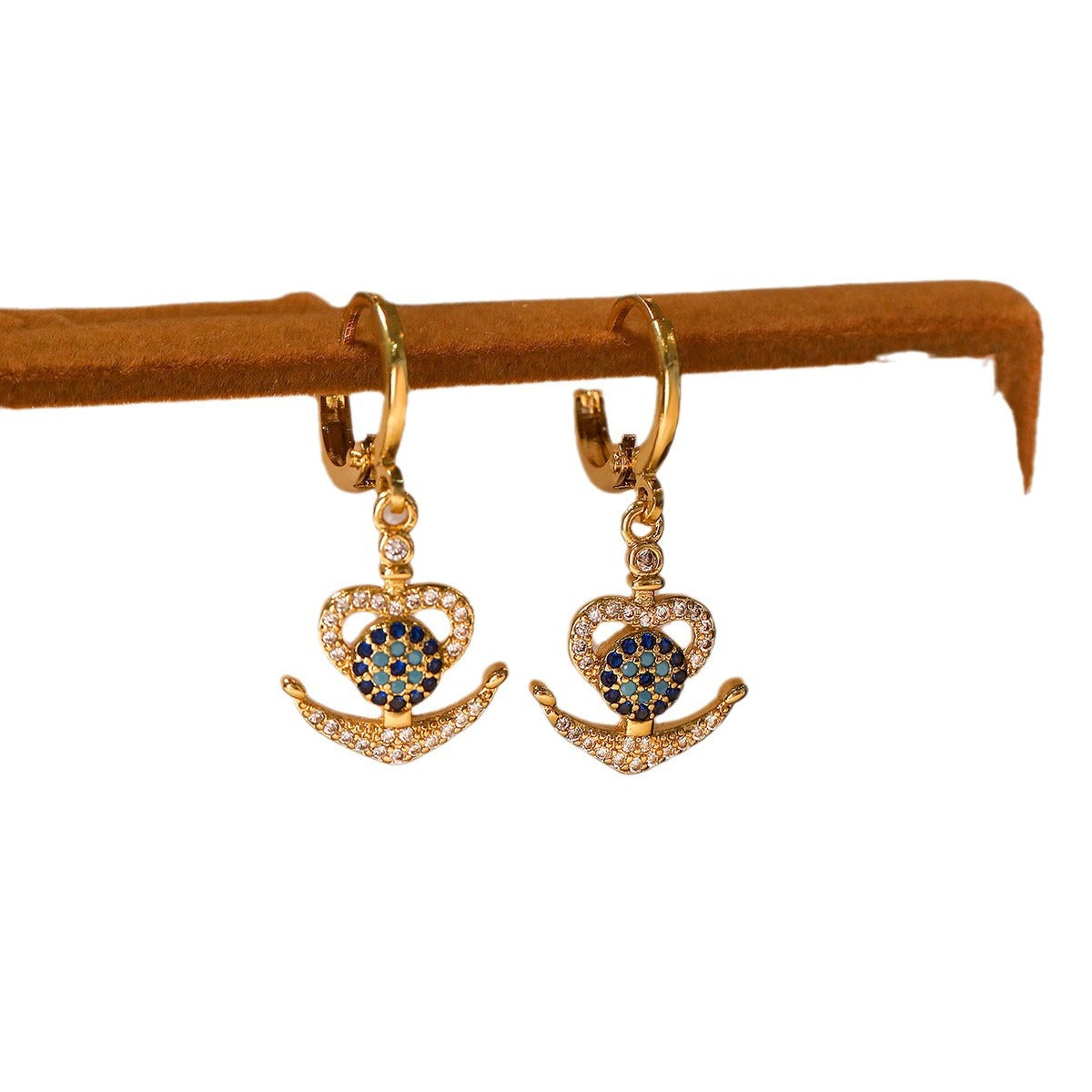 Collana con ciondolo e orecchini a forma di occhio di Hamsa geometrico minimalista in ottone con placcatura in oro e intarsi in zirconi