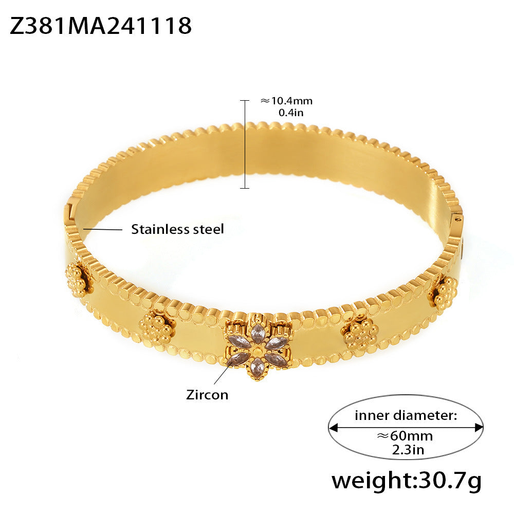 Pulsera de acero inoxidable con forma de copo de nieve y rueda de la fortuna, con incrustaciones de circonita y chapado en oro de 18 quilates.