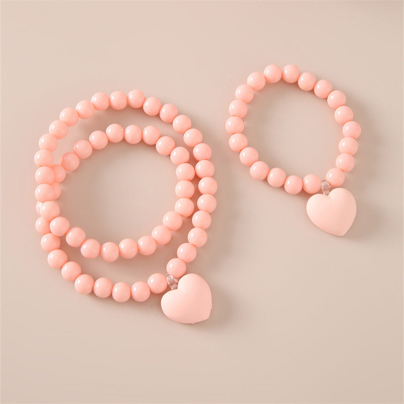Set collana con ciondolo acrilico a cuore minimalista per bambini con catena di perline di plastica