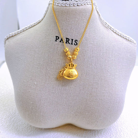 Collar minimalista geométrico de bolsa de dinero en acero de titanio con colgante de cobre chapado en oro, accesorio de moda elegante y versátil