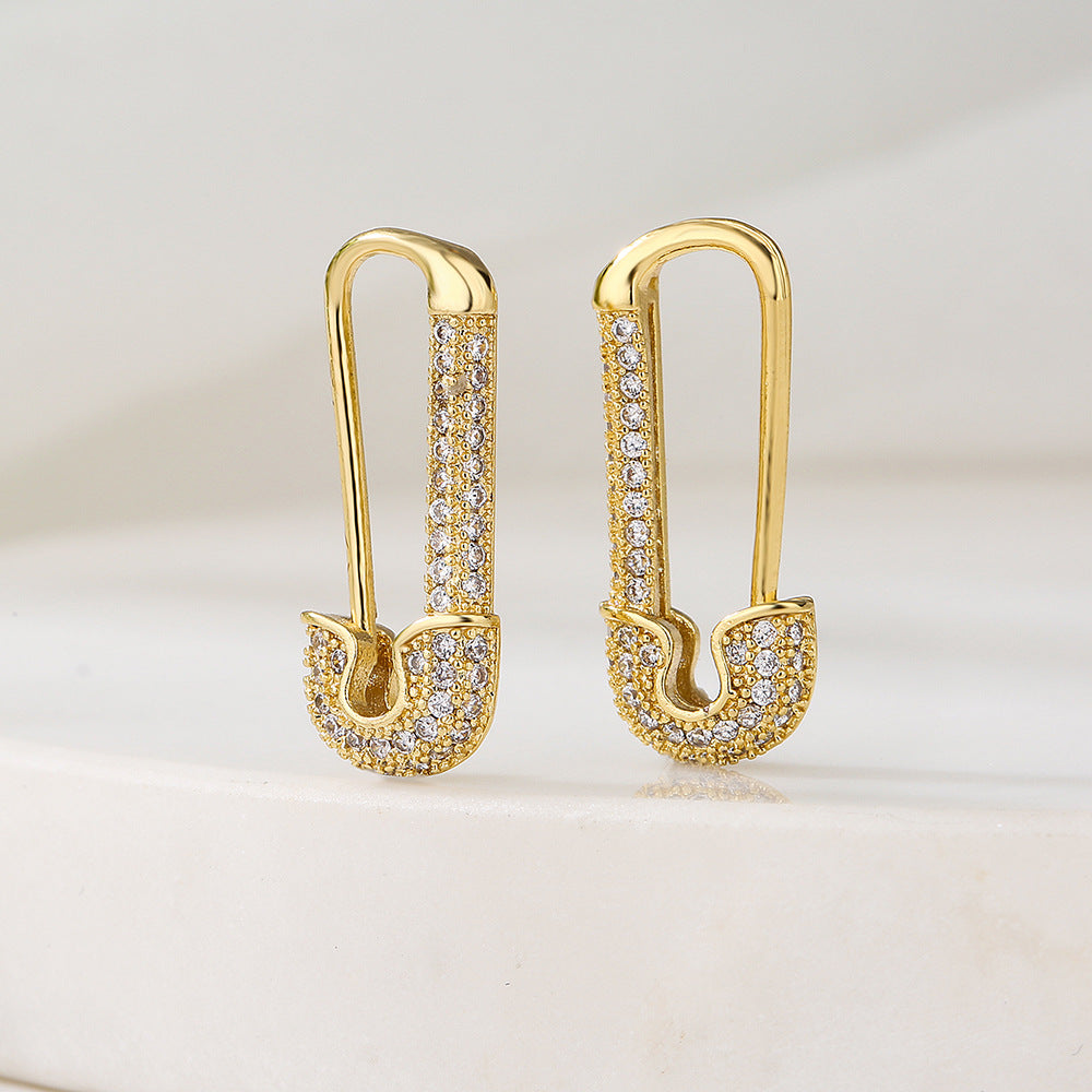 Orecchini da donna geometrici in rame con placcatura in oro e zirconi micro-pavé, design minimalista di lusso