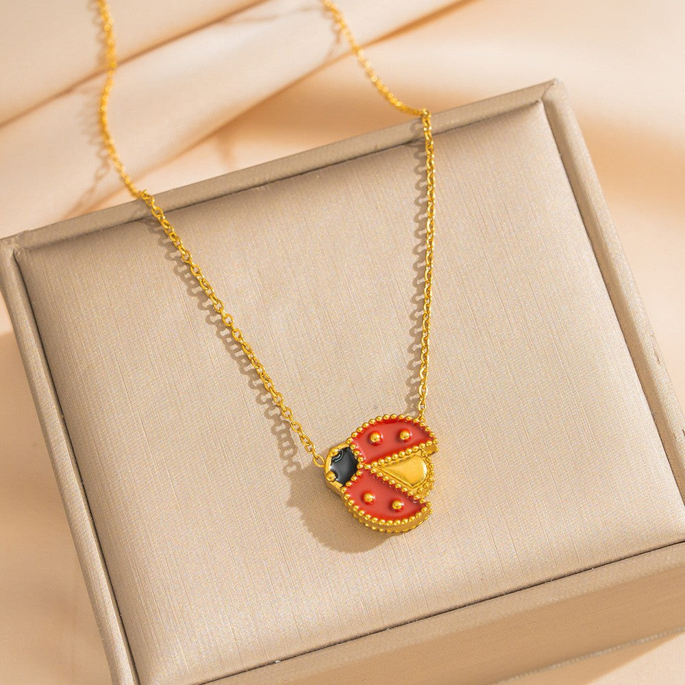 Set di gioielli da donna con fiore a conchiglia a coccinella in acciaio al titanio placcato oro 18 carati e bracciale a catena O con olio smaltato a goccia, minimalista