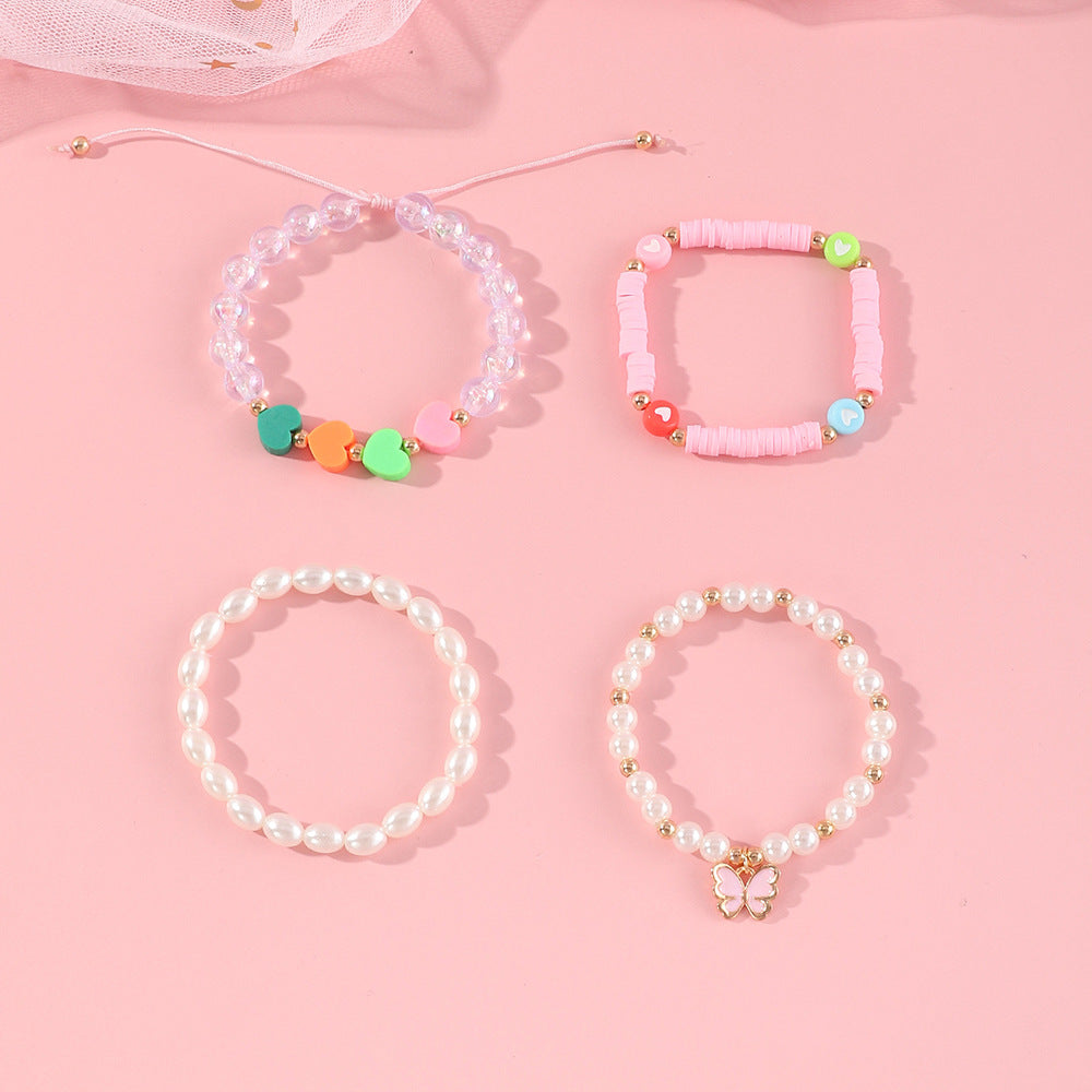 Pulsera de arcilla polimérica con mariposa y corazón esmaltados hechos a mano para niñas con detalles de perlas, bonito y versátil conjunto de joyas infantiles