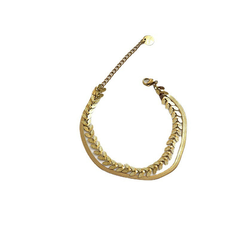 Pulsera minimalista de doble capa de trigo y hojas para mujer con construcción de acero de titanio y baño de oro
