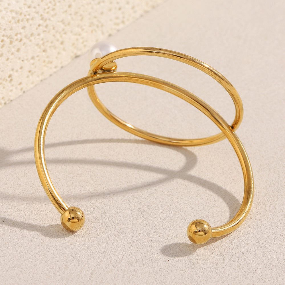 Minimalist Stainless Steel Bracelet with 18K Gold Plating, Pearl-Embellished Knot Detail and Geometric Circular Design for Women
