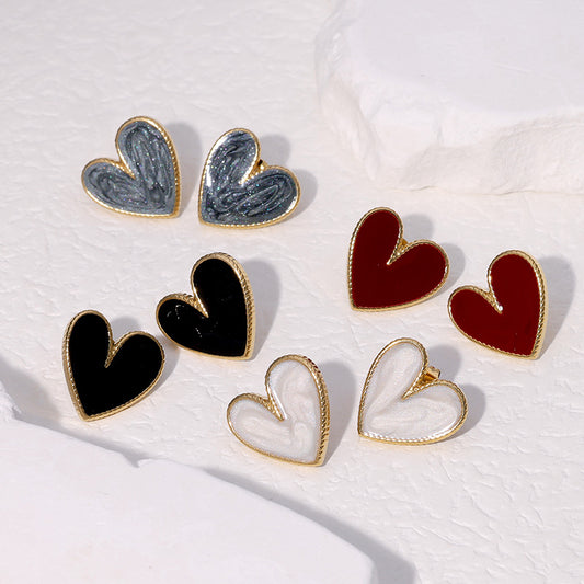 Pendientes de tuerca minimalistas de acero inoxidable con forma de corazón para mujer con acabado chapado