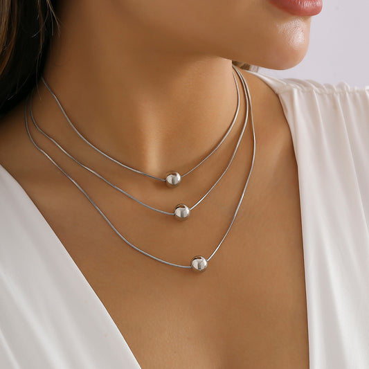 Collar con colgante geométrico estilo punk para mujer con cadena de serpiente multicapa y construcción metálica