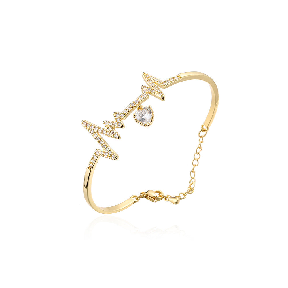 Gold Plated Brass Heartbeat Bracelet with Cubic Zirconia Inlay