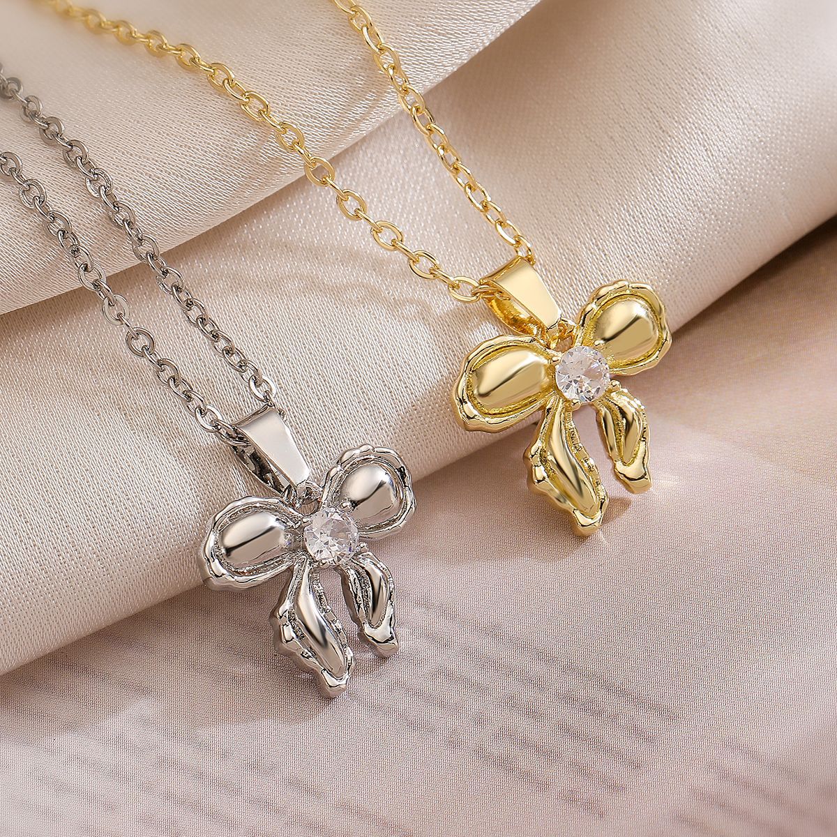 Minimalist Bowknot Pendant Necklace for Women in Copper with 18K Gold Plating and Zircon Accents