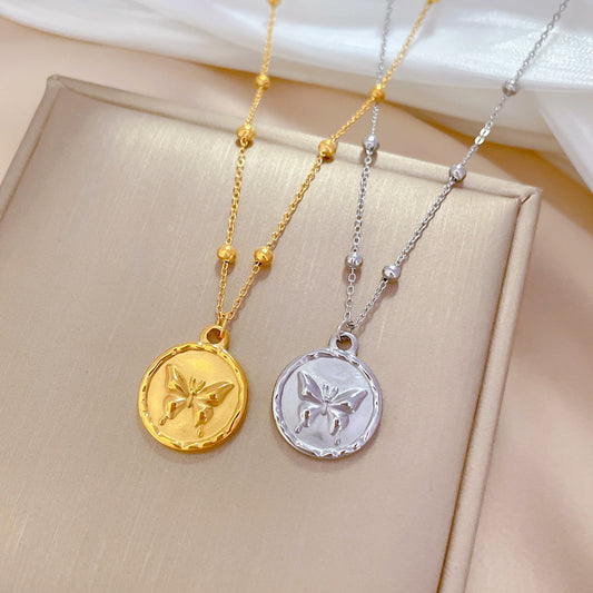Collana da donna a farfalla minimalista in acciaio al titanio con placcatura in oro e catena a medaglione con design geometrico