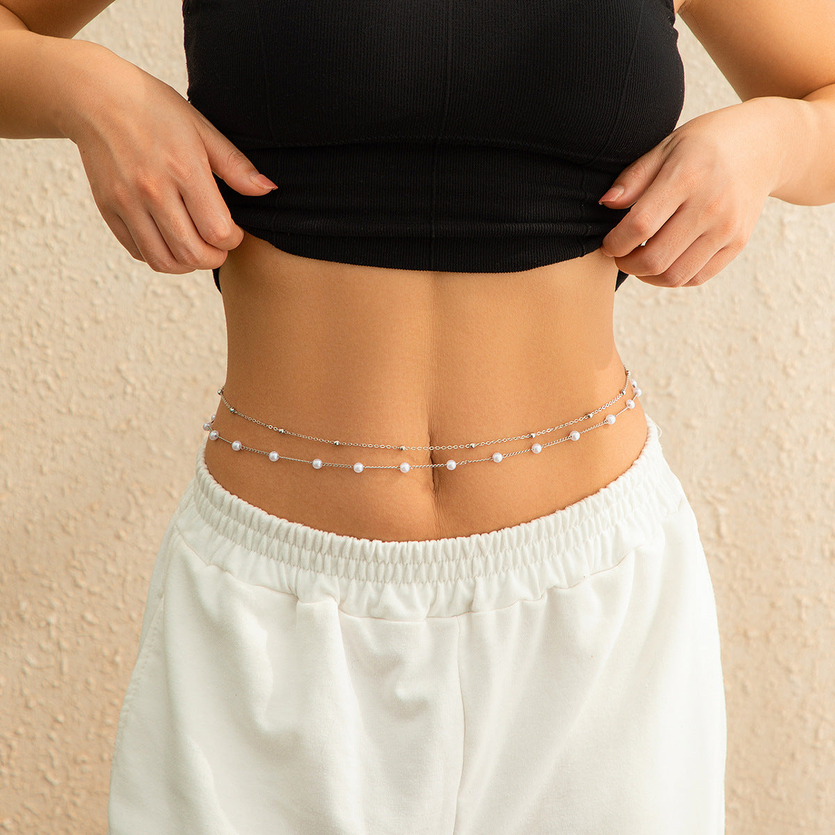 Cadena corporal doble para mujer de estilo minimalista frío-neutro con diseño de cadena de serpiente y cierre de langosta en metal