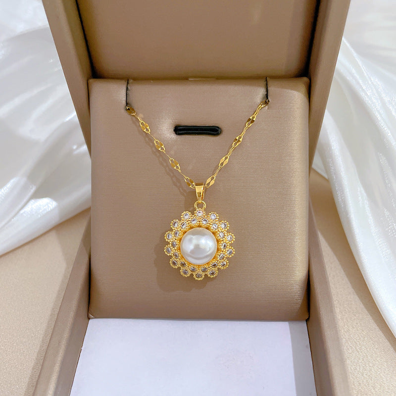 Collana con pendente minimalista a nido con perle e strass in acciaio al titanio con design geometrico per donna e uomo
