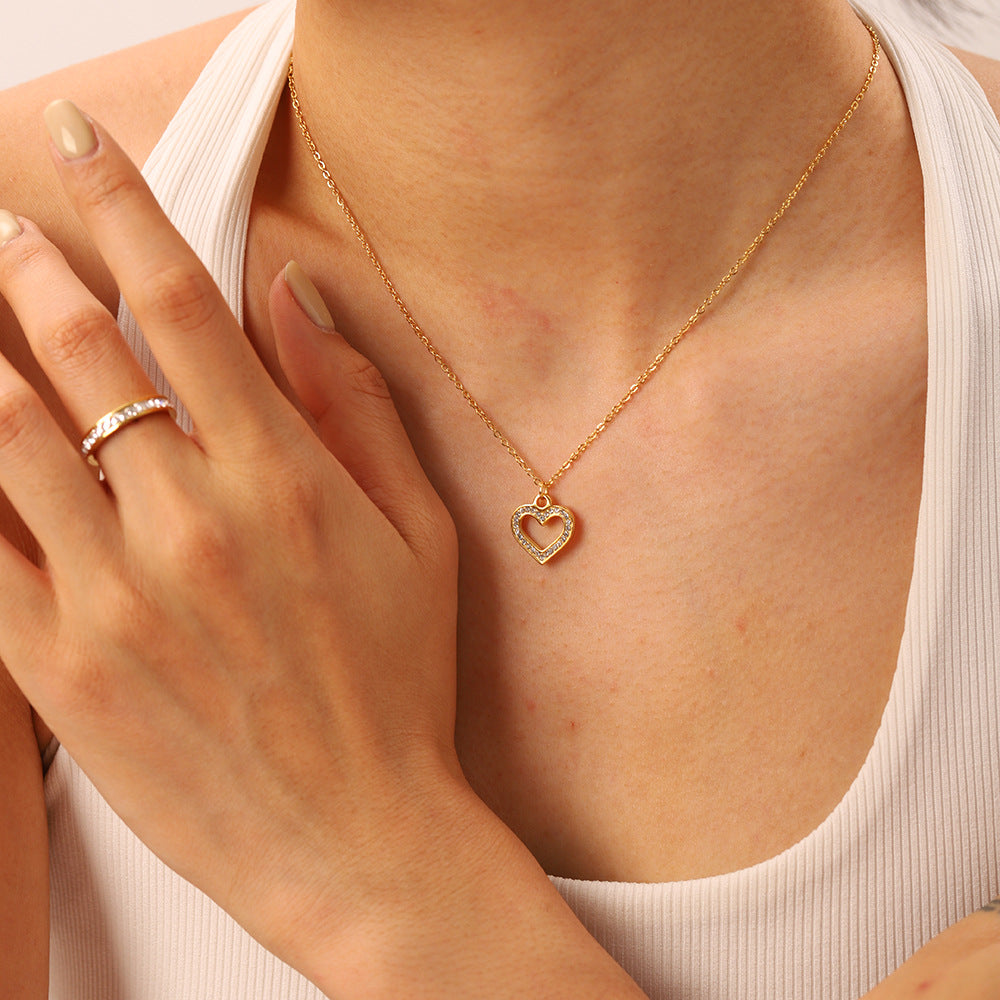 Ins Style Heart Shaped Stainless Steel Necklace with Vacuum Plated 18K Gold Finish and Hollow Design Featuring Clear Zirconia Accents for Women