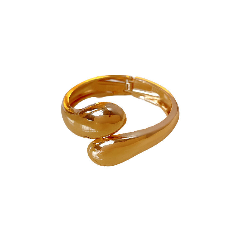 Bracciale rigido minimalista in metallo regolabile da donna con finitura placcata e sottile accento a goccia