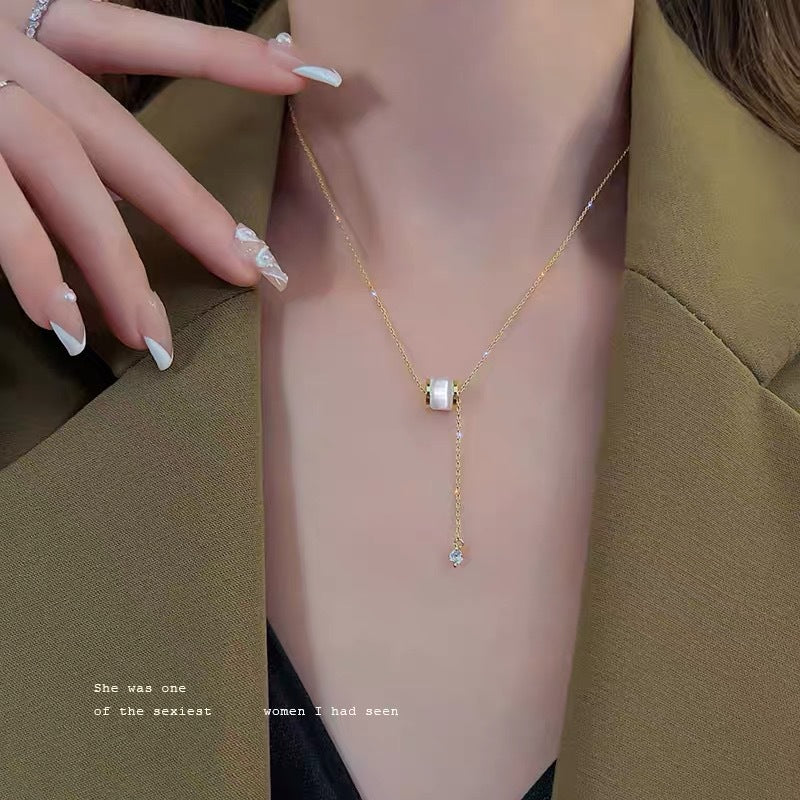 Collana con pendente in acciaio al titanio geometrico stile naturale con pietra occhio di gatto e nappa per donna