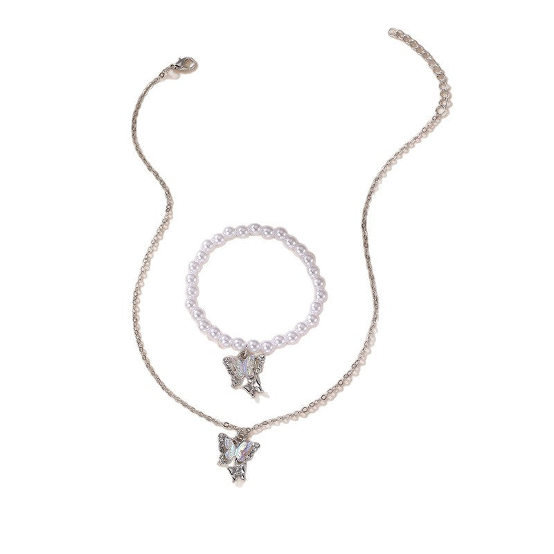 Juego de collar con colgante minimalista de perlas y resina en forma de lazo para niñas, con acabado esmaltado y cadena de cuentas