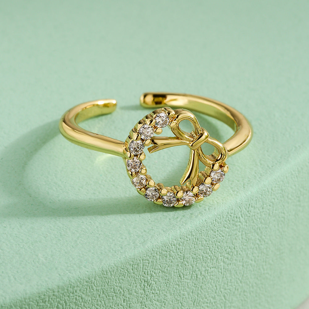 Minimalist Geometric Bowknot Opening Ring for Women in Copper with Gold Plating and Cubic Zirconia Inlay