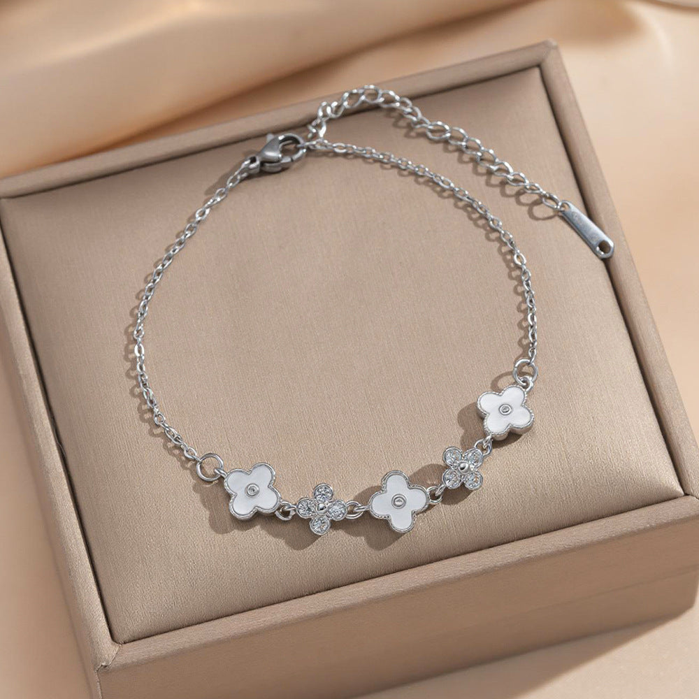 Bracciale da donna in acciaio al titanio placcato oro con zirconi intarsiati, motivo floreale e geometrico, stile pendolare, moda lusso leggero