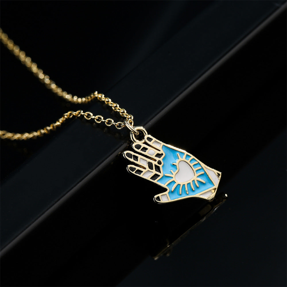 Minimalist Hand-Shaped Pendant Necklace in Copper with 18K Gold Plating and Enamel Detail