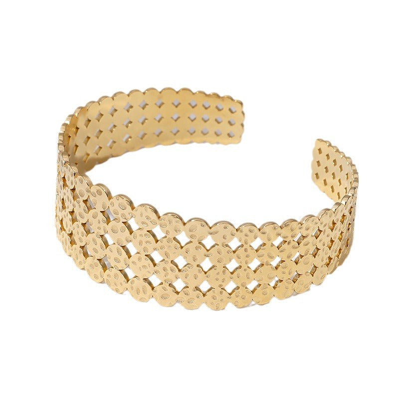 Bracciale rigido aperto geometrico in acciaio inossidabile da donna con finitura placcata e aspetto metallico di lusso