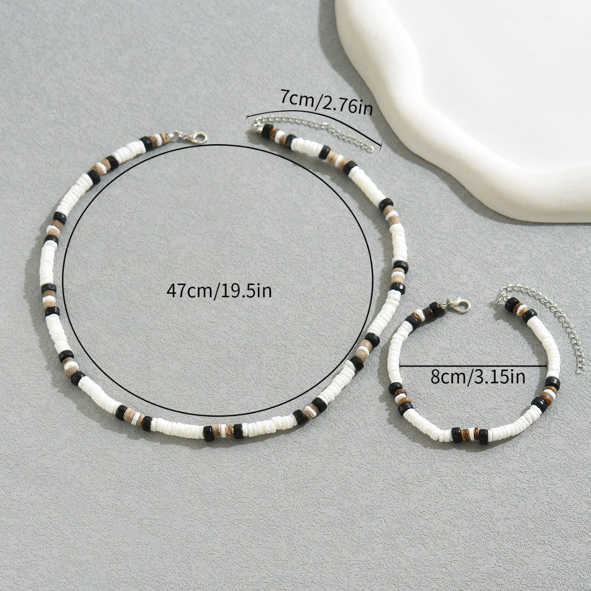 Set collana e bracciale in maglia a conchiglia geometrica da donna con dettagli circolari e a pois