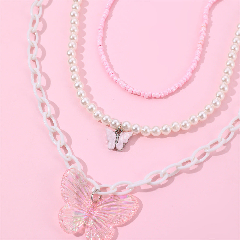 Set collana con ciondolo a farfalla rosa per bambine con ciondolo in resina e catena di perle in stile principessa per primavera ed estate