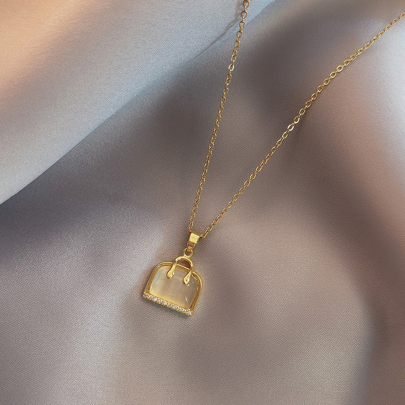 Elegant Cat's Eye Stone Pendant Necklace for Women Titanium Steel Cross Chain Geometric Design Clavicle Chain with Plating Finish
