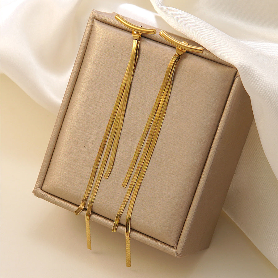 Orecchini da donna di lusso eleganti con catena a serpente placcata oro in acciaio inossidabile e nappe geometriche