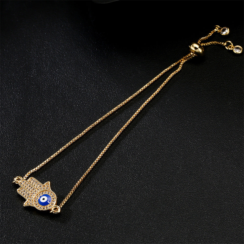 Exotic Geometric Evil Eye Hand Chain in Gold-Plated Copper with Micro-Pave Zirconia
