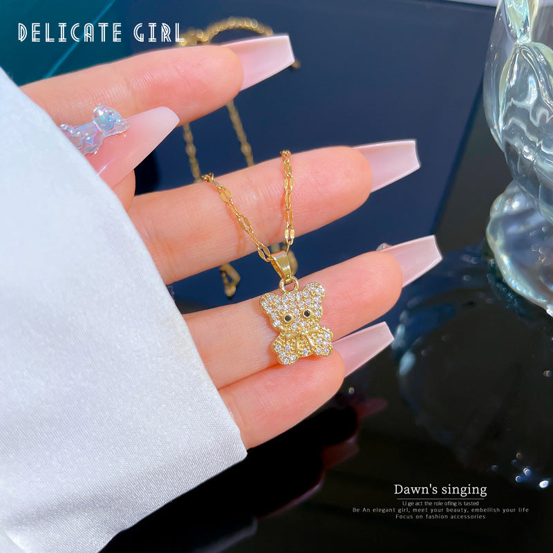 Collana con ciondolo orsetto minimalista in acciaio al titanio con intarsio di zirconi per donna e uomo