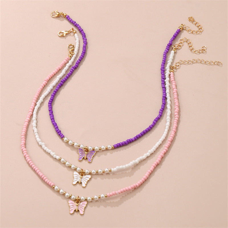 Collana con Ciondolo a Farfalla Smaltata in Stile Bohemien con Perle di Vetro per Bambini, Catenina con Perline Rotonde Fatta a Mano