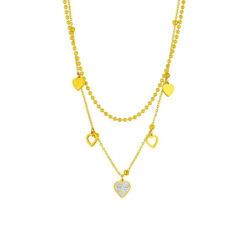 Collana con ciondolo a cuore doppio strato minimalista in acciaio al titanio con intarsio in strass e finitura placcata da donna