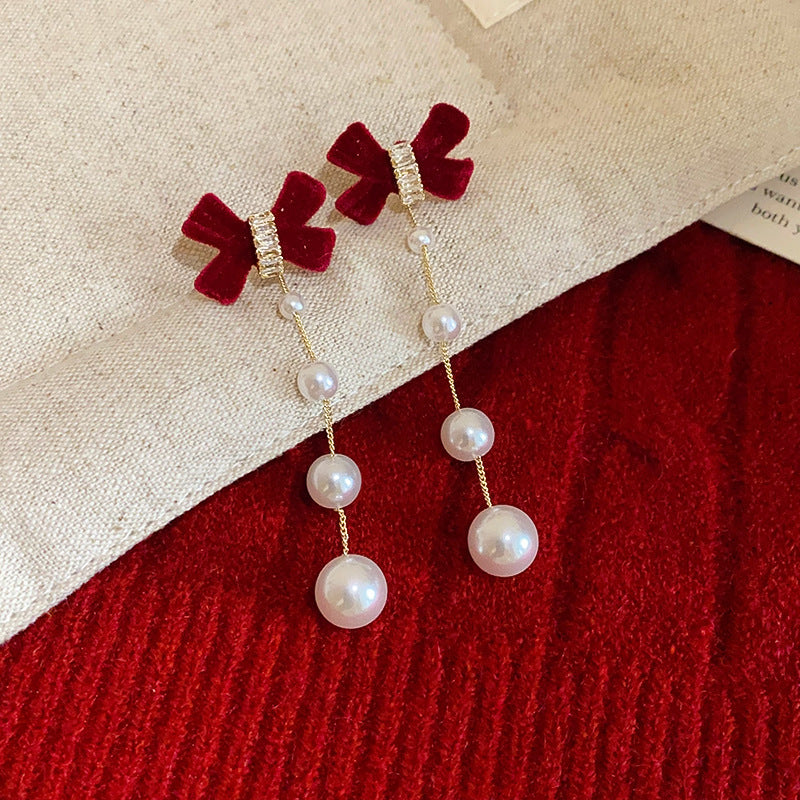 Orecchini di lusso a fiocco con cuore e motivo floreale in lega con intarsio di strass e perni in argento 925