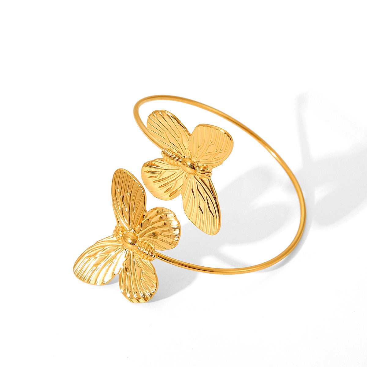Bracciale minimalista a farfalla in acciaio inossidabile con finitura placcata da donna, gioielli a polsino aperto regolabile