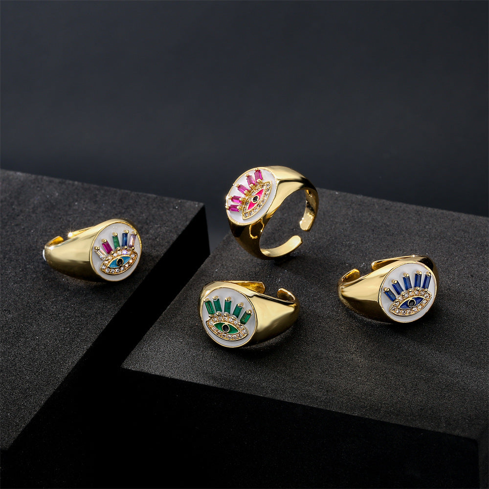 Geometric Brass Gold Plated Ring with Cubic Zirconia and Drip Oil Eye Design for Women