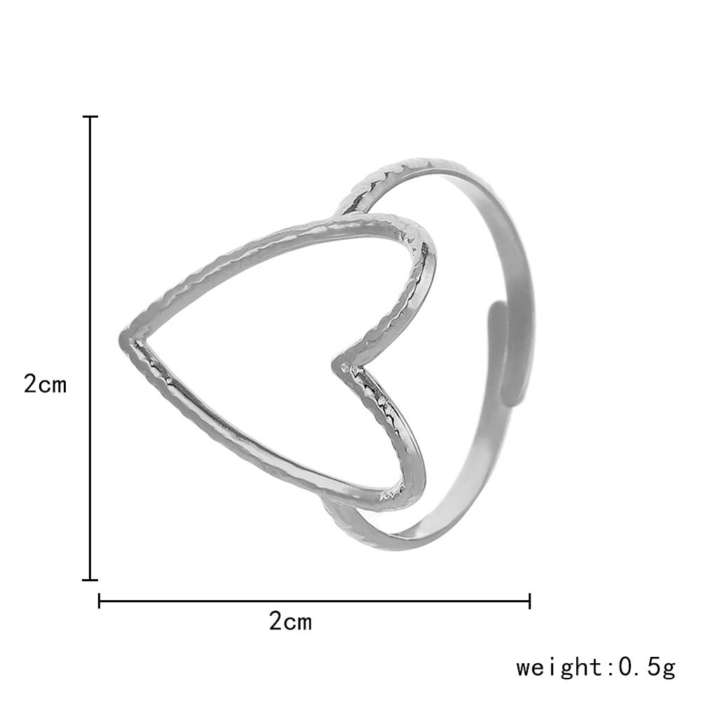 Anello da donna a cuore aperto, in acciaio al titanio, con finitura placcata e design minimalista traforato