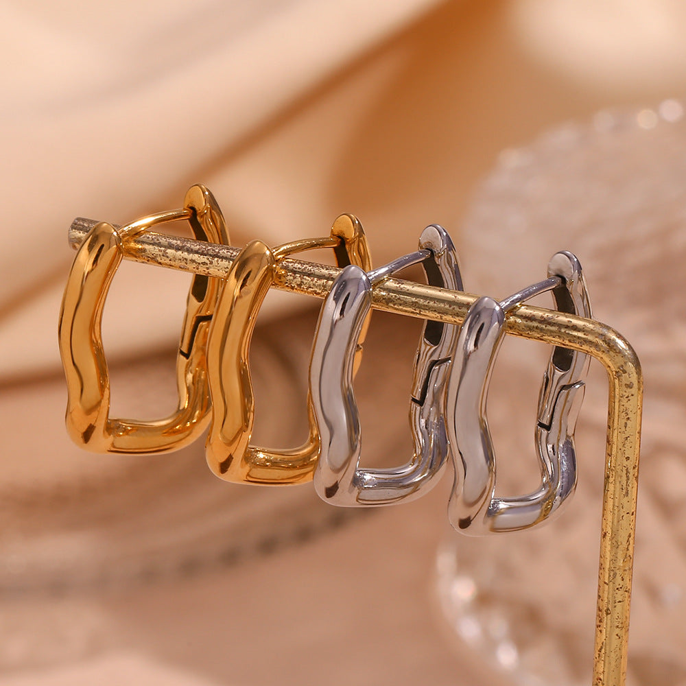 Pendientes de aro geométricos minimalistas en forma de U de acero inoxidable chapados en oro de 18 quilates para mujer