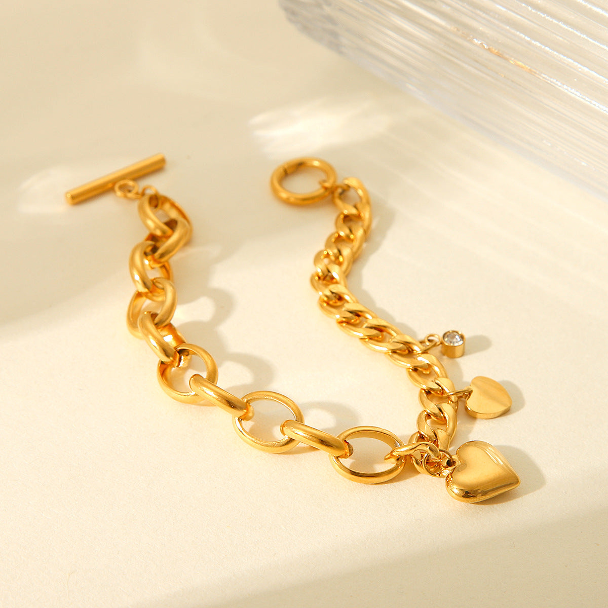 Bracciale da donna a catena cubana ovale con ciondolo a cuore in zirconia in stile INS, in acciaio inossidabile placcato oro 18K