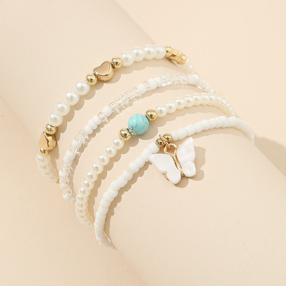 Tobillera de Perlas en Forma de Mariposa Minimalista para Niñas con Diseño Tejido a Mano y Acento de Estrella