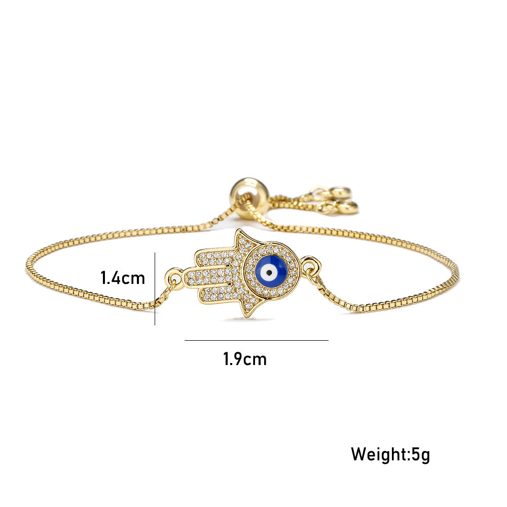 Exotic Geometric Evil Eye Hand Chain in Gold-Plated Copper with Micro-Pave Zirconia