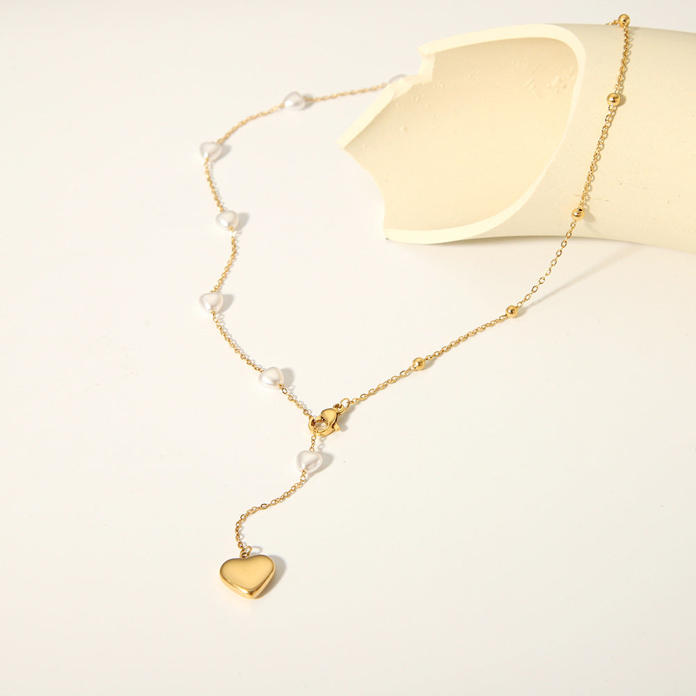 Minimalist Heart-Shaped Titanium Steel Pendant Necklace for Women with Plated Stainless Steel Chain and Pearl Accent