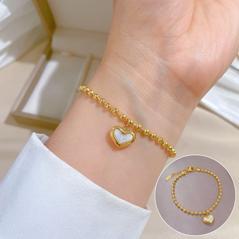 Pulsera de mano bohemia vintage de acero de titanio con corazón, cuentas redondas y ondas para mujer