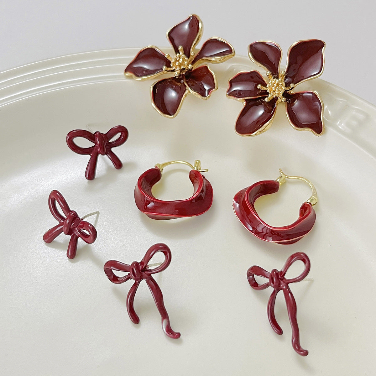 Minimalist Alloy Geometric Bow Drip Oil Earrings for Women