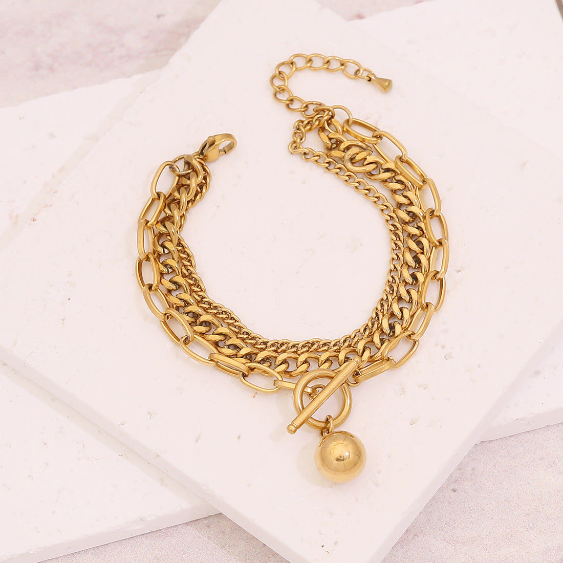 Edgy Geometric Anchor and Ship Wheel Pendant Stainless Steel Bracelet for Women with Plated Finish