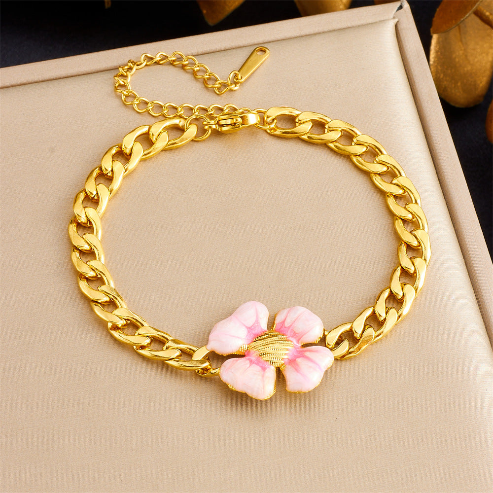 Bracciale con ciondolo floreale e a cuore in stile vintage in acciaio inossidabile con finitura placcata da donna