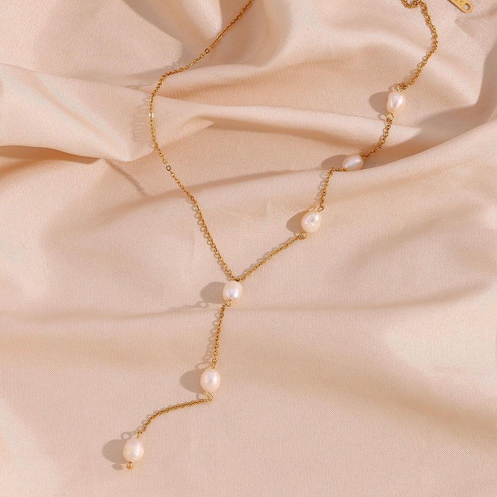 Collana a Y minimalista da donna con catena in acciaio inossidabile e pendente di perla d'acqua dolce