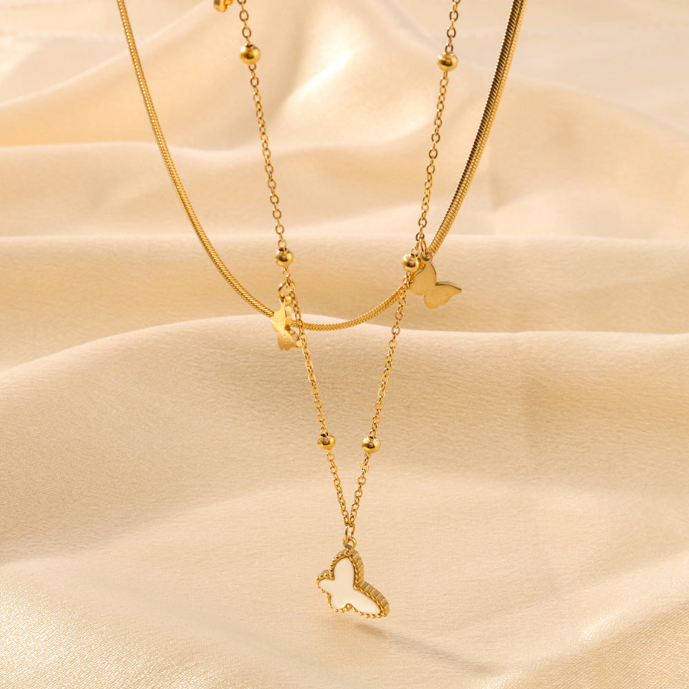 Collana Farfalla Minimalista a Doppio Strato con Catena in Acciaio Inossidabile e Ciondolo in Abalone Bianco