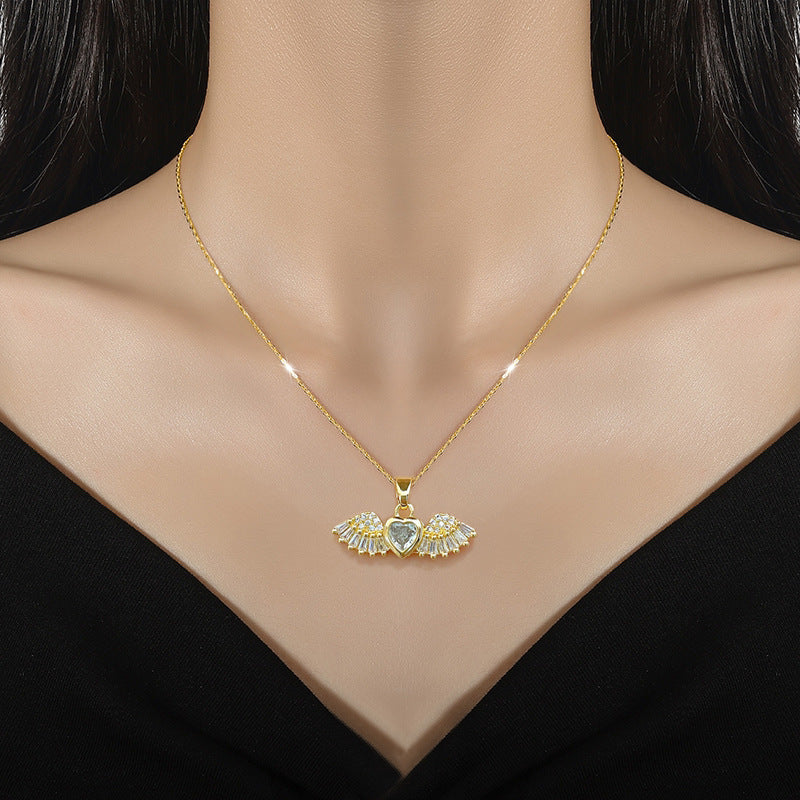 Collana con ciondolo a forma di ala d'angelo in acciaio al titanio di lusso da donna con design geometrico e catena a maglie sottili