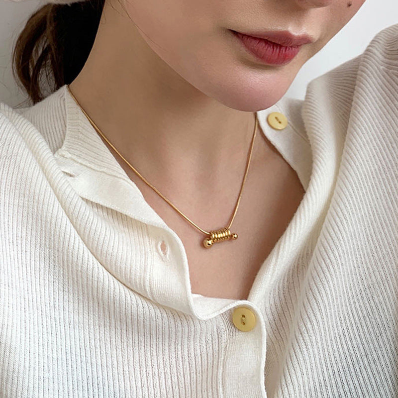 Minimalist Golden Titanium Steel Spiral Snake Chain Necklace for Women with Geometric Design and Clean Aesthetic