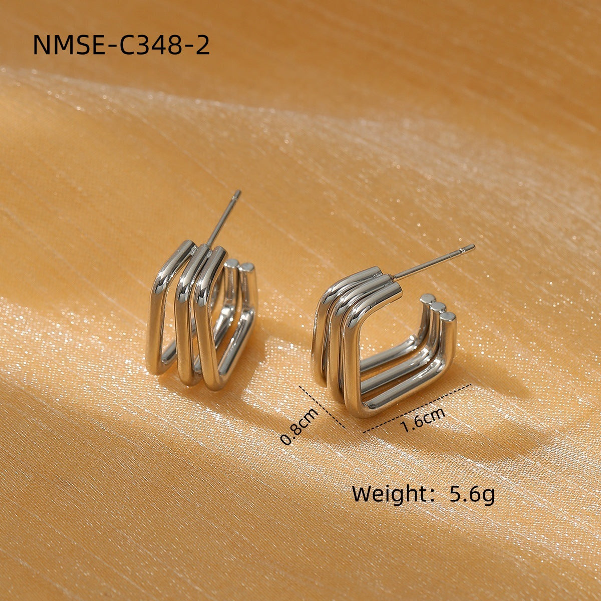Aretes de titanio con diseño geométrico circular exagerado y acabado galvanizado para mujer